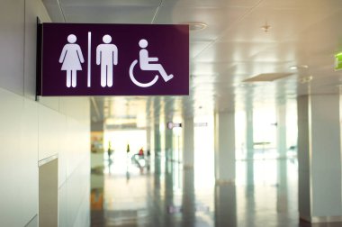 Tuvalet simgesi. Engelli erişim simgesi olan genel tuvalet işaretleri.