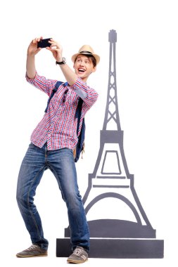 Tam uzunlukta stüdyo portre yakışıklı genç adamın eifel kulesi selfie alarak