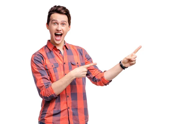 Studio Portrait Happy Handsome Young Man Pointing Copy Space — Stock Photo, Image