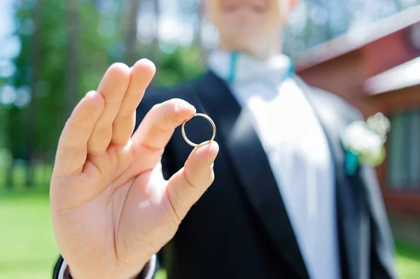 Happy Groom Holding Golden Ring His Hand Focus Ring — Stock Photo, Image