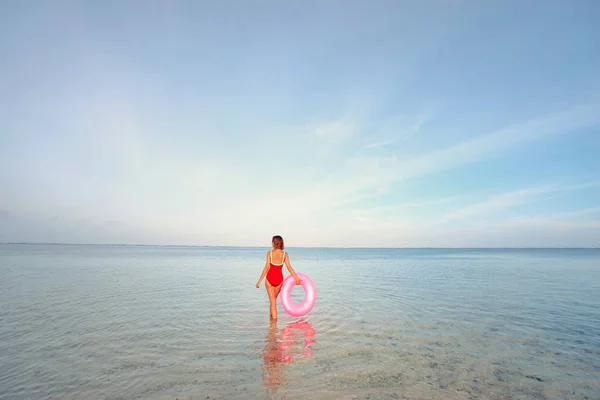 Young Woman Red Swimsuit Pink Rubber Ring Beach — Stock Photo, Image