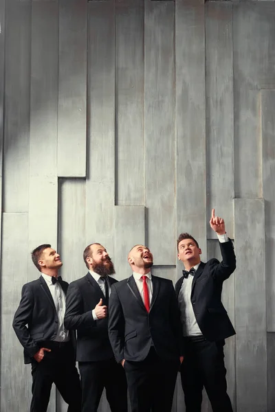 Group Interested Business People Looking Four Elegant Young Men Wearing — Stock Photo, Image