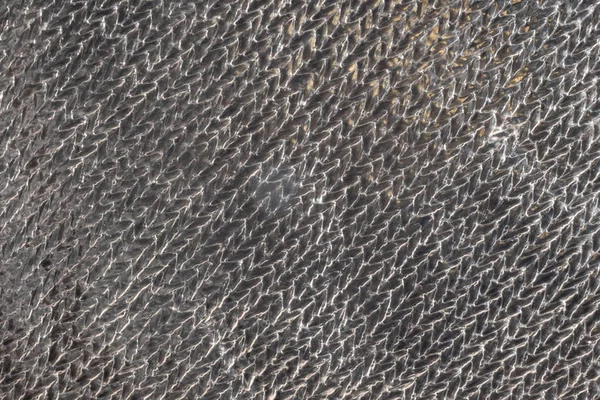 Textúra inas porózus műanyag fém fekete sötét makró — Stock Fotó