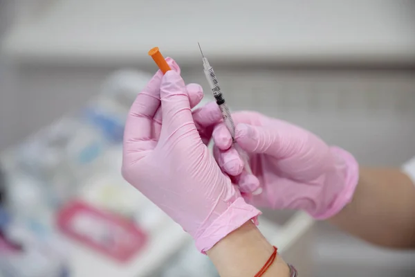 Hands Pink Medical Gloves Holding Syringe — Stock Photo, Image