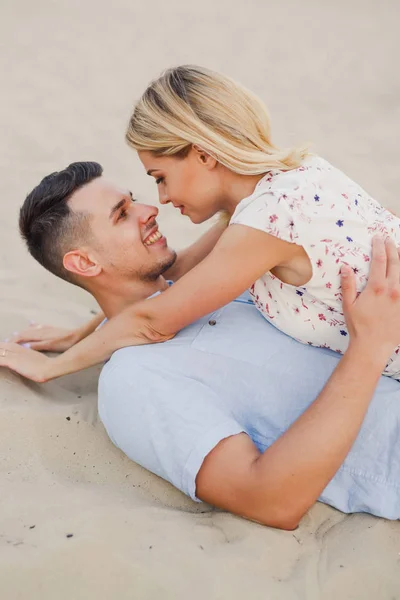 Young Couple Posing Lying Sand — Stock Photo, Image