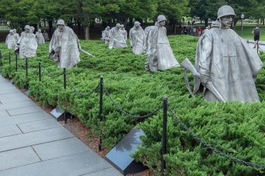 WASHINGTON DC, USA - AUGUST 31, 2018: The Korean War Veterans Memorial that commemorates those who served in the Korean War. Located in West Potomac Park, southeast of the Lincoln Memorial. clipart