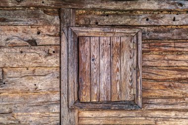 Background with wooden wall detail of an old peasant house clipart