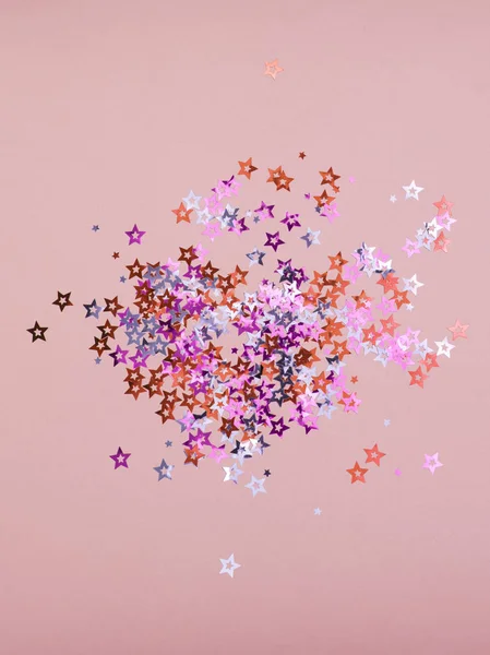 Beautiful peach background with glittering abstract sparkles, paillette, texture for design, mock-up