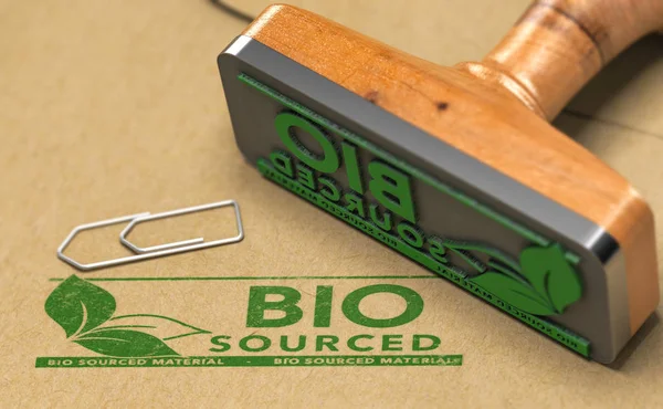 Biocourced 材料在纸背景上加盖绿色 橡皮印 — 图库照片