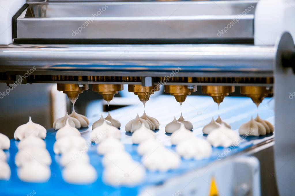 production line conveyor making meringues in confectionery factory
