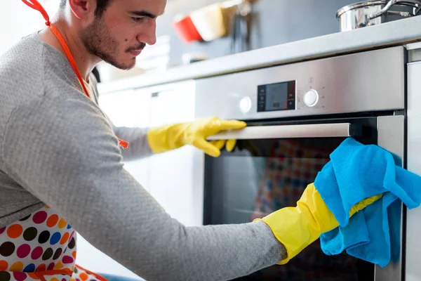 Young Man Yellow Gloves Cleaning Kitchen — Stock Photo, Image