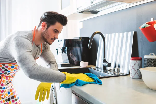 Young Man Yellow Gloves Cleaning Kitchen — Stock Photo, Image