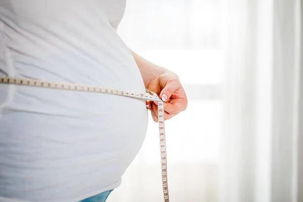 Pregnant Woman Measuring Stomach Using Measuring Tape — Stock Photo, Image