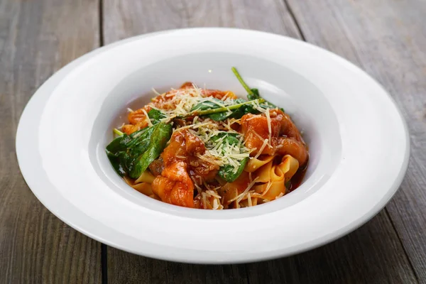 Italian pasta with smoked salmon and spinach