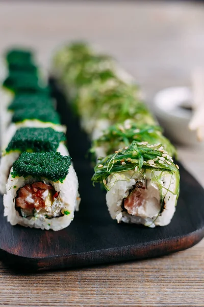 sushi rolls with  calf caviar and chuka seaweed