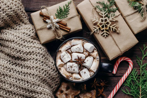 Christmas background with hot chocolate and gifts