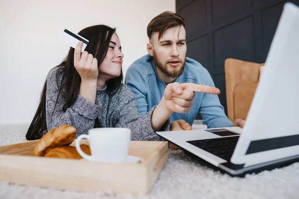 Couple buying online with credit card