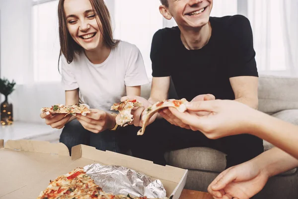 food delivery, leisure, party. people eating pizza