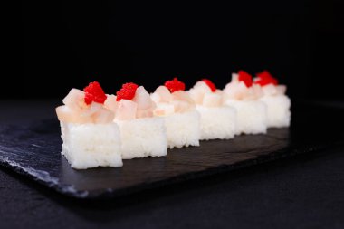deniz ürünleri Restoran, Sushi tarak ile basıldığında