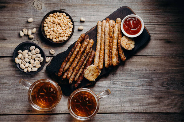 craft beer and sausages.oktoberfest food, pub