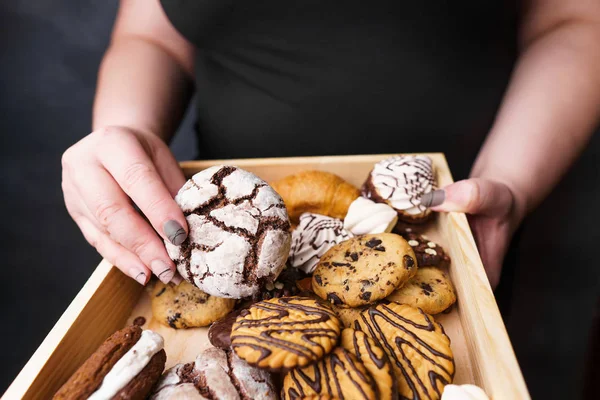 overweight woman eating fattening sweets