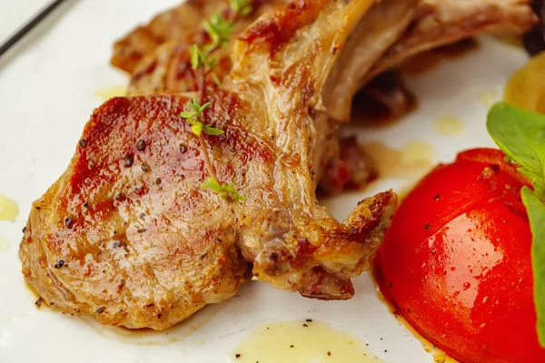 Lamb rack with grilled vegetables salad on plate — Stock Photo, Image