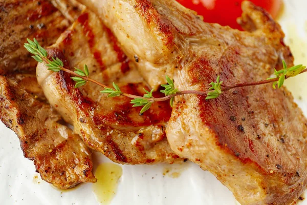 Lamb rack with grilled vegetables salad on plate — Stock Photo, Image