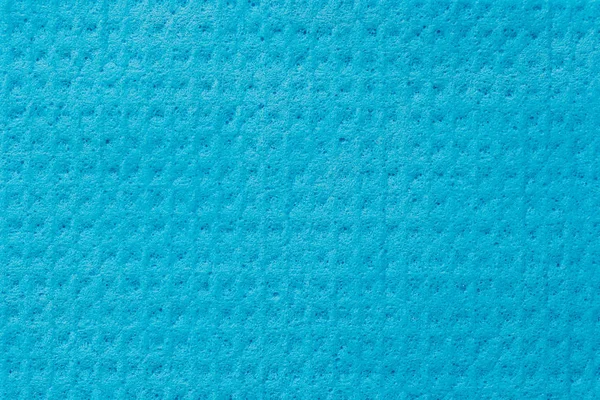 Abstracte textuur van blauwe spons voor het reinigen. — Stockfoto