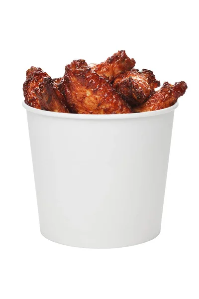 Deep fried chicken wings in take out bucket isolated on white background