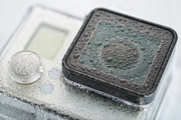 Lente de cámara de acción con gotas de agua —  Fotos de Stock