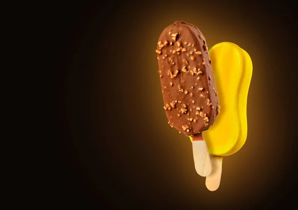 Yellow and chocolate popsicles — Stock Photo, Image