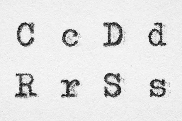 Справжня абетка шрифту друкарської машинки з літерами C, D, R, S — стокове фото