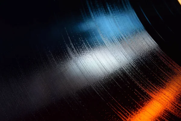 Gros Plan Rainure Disque Vinyle Pouces Avec Lumières Bleues Orange — Photo