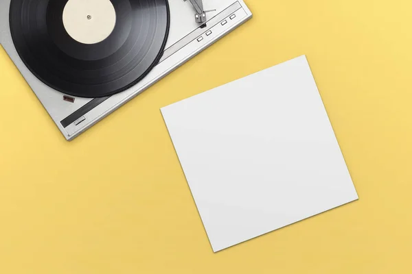 Vinylspeler Met Lange Speel Plaat Lege Blanco Cover Gele Achtergrond — Stockfoto