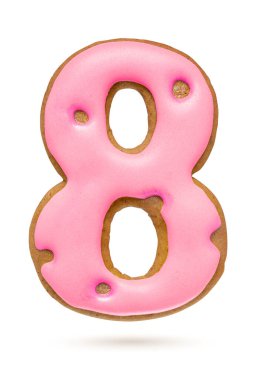 Beyaz arka planda 8 numaralı pembe zencefilli bisküvi. Noel süslemesi