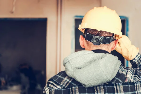 İnşaat işçisi iş. Beyaz Sarı Sabit erkeklerde Closeup fotoğraf şapka. 