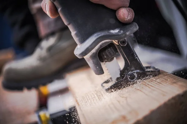 Reciprocating Saw Woodwork Closeup Photo Caucasian Contractor Cutting Wooden Element — Stock Photo, Image