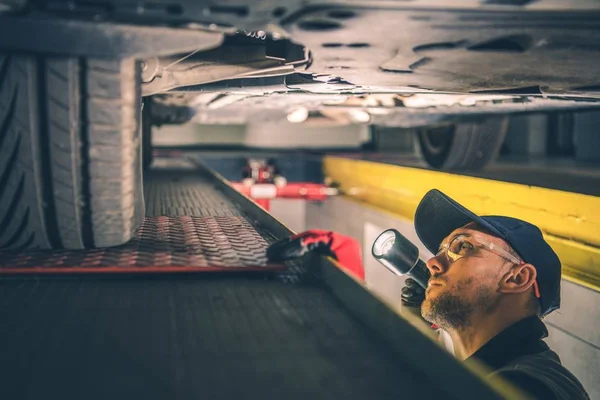 Car Suspension Issue Caucasian Vehicle Mechanic Flashlight Inspecting Car Undercarriage — Stock Photo, Image