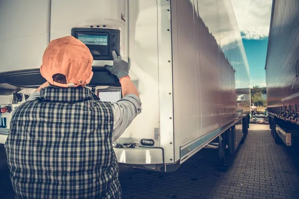 Trucker Adjusting Temperature Refrigerated Semitrailer Transportation Industry Theme — Stock Photo, Image