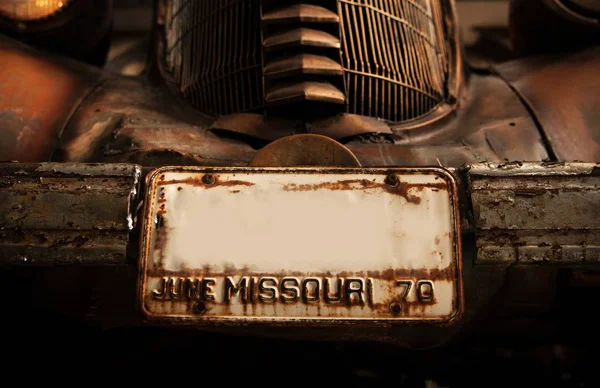 Rusty Classic Car Registration Missouri Plate. Vintage Transportation Concept.