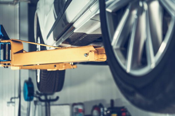 Broken Car on a Lift