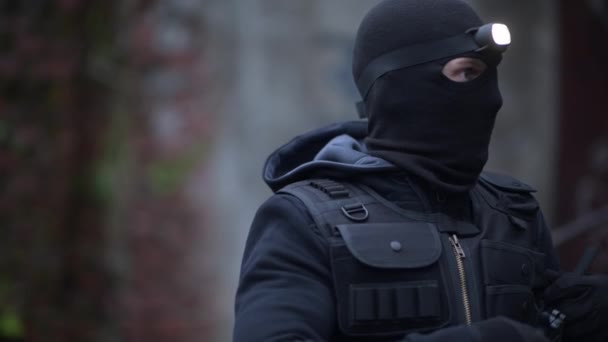 Counter Terrorist in Black Mask and Head Flashlight. Police Top Secret Operation. — Stock Video