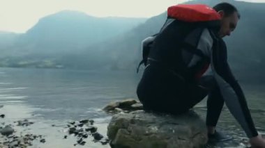 Kayaker Cold Mountain Lake Water Into Jumping