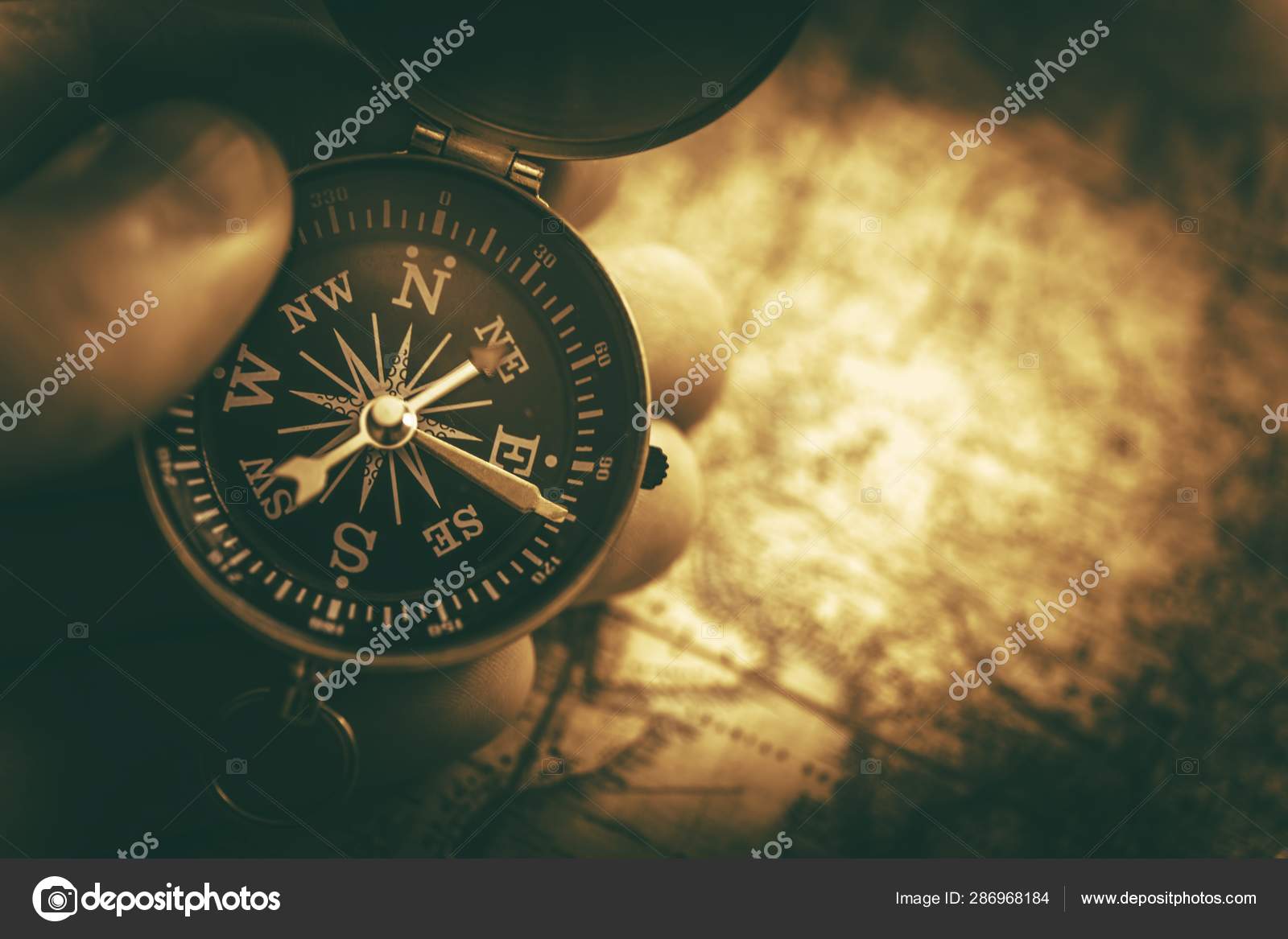 Travel Destination with Compass Stock Photo by 286968184