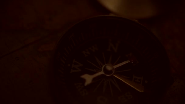 Expedition and Adventure Concept. Aged Old World Map and the Old Compass Device — Stock Video