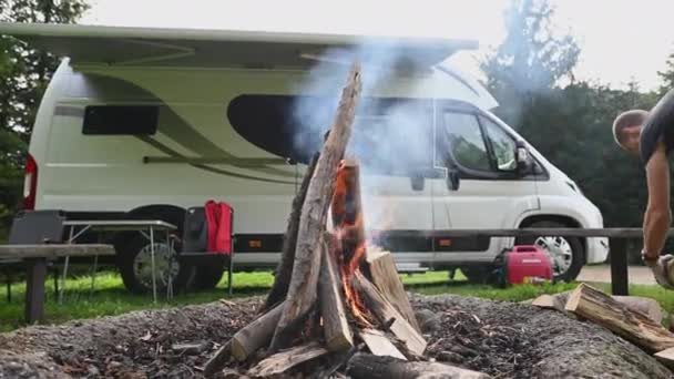 Caucasian Men His 40S Burning Wood Feeding Campfire Campground Camper — Stock Video