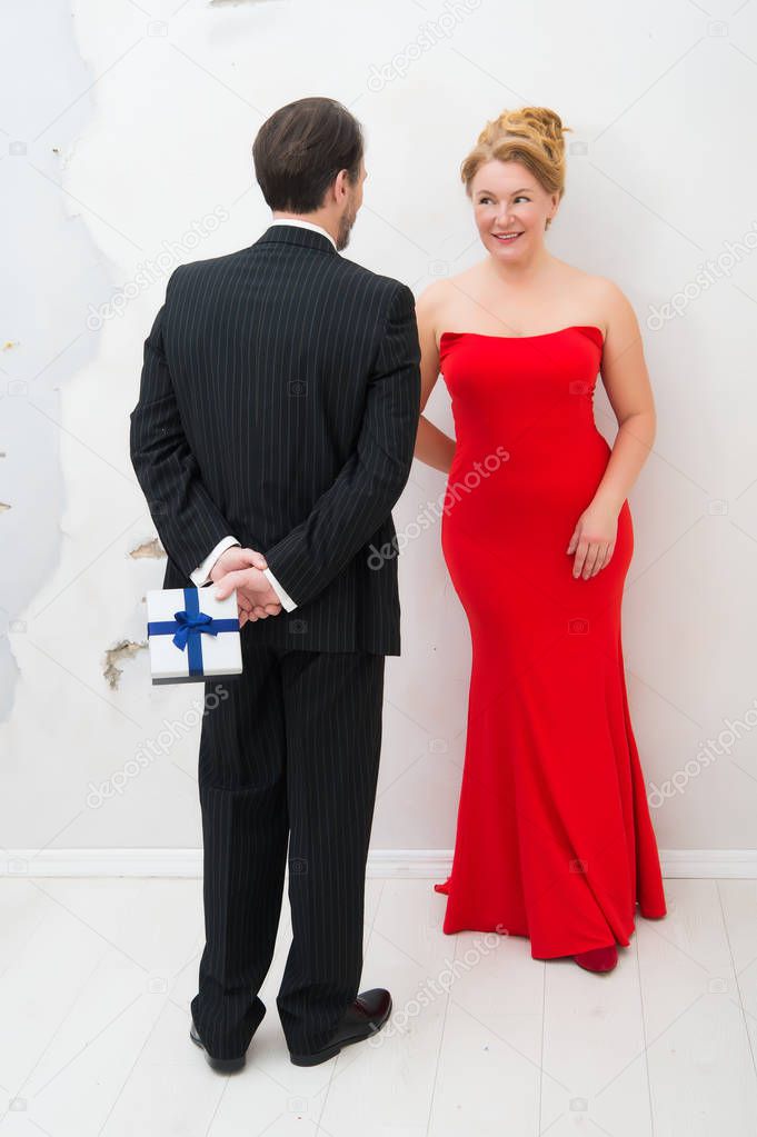 Delighted elegant woman expecting surprise from her husband