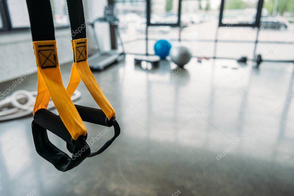 closeup view of suspension training trx at gym 