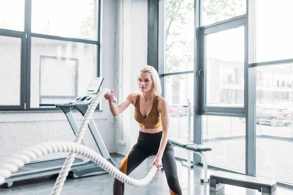 Young Sportswoman Working Out Battle Ropes Gym — Stock Photo, Image