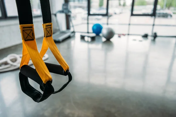 Closeup view of suspension training trx at gym — Stock Photo